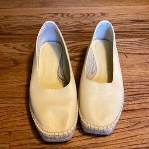 Everlane butter yellow espadrille shoes.